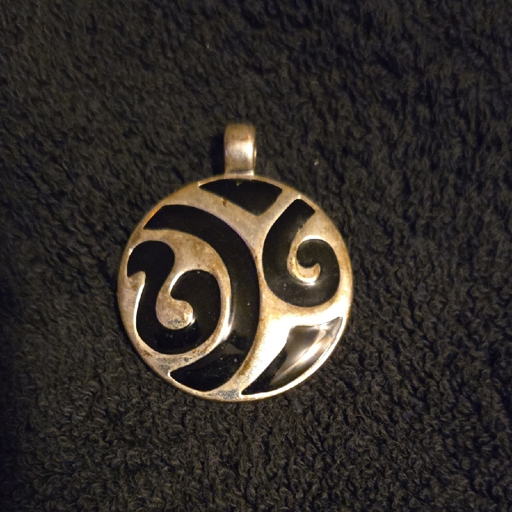 Elegant Black and Silver Swirl Pendant